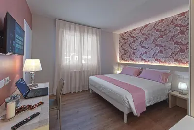 Letto o letti in una camera di Civico 4 Affittacamere