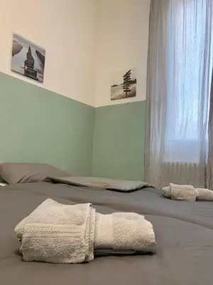 Letto o letti in una camera di Casa Milena