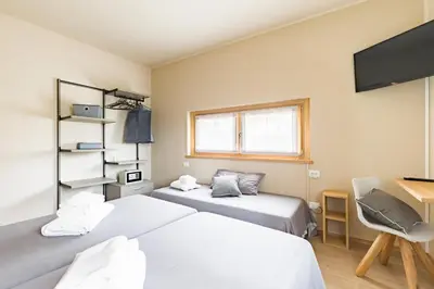 Letto o letti in una camera di Guest House La Sosta