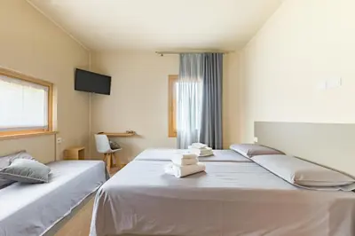Letto o letti in una camera di Guest House La Sosta