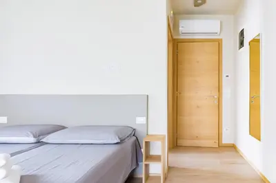 Letto o letti in una camera di Guest House La Sosta