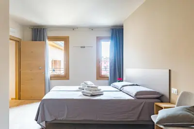 Letto o letti in una camera di Guest House La Sosta