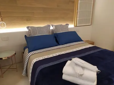 Letto o letti in una camera di Vecchia Bastia Lodge