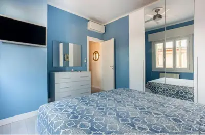 Letto o letti in una camera di Casa Davide