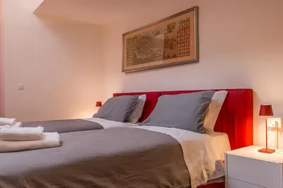 Letto o letti in una camera di Red House close to @Accademia Bridge