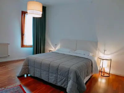 Letto o letti in una camera di Ca' Palazzo