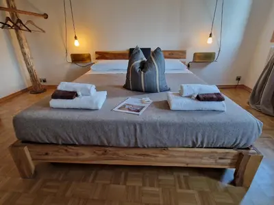 Letto o letti in una camera di Residenza La Veranda a Rialto