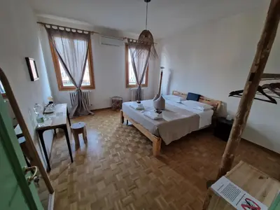 Letto o letti in una camera di Residenza La Veranda a Rialto