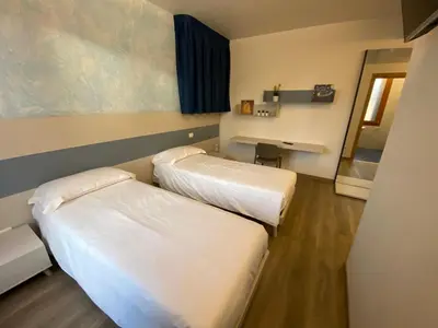 Letto o letti in una camera di Casa Nostra
