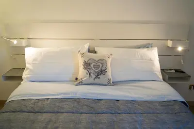 Letto o letti in una camera di All’Altana b&b apartment