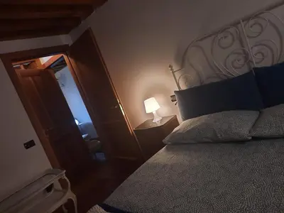 Letto o letti in una camera di Mini Contrà Pescherie