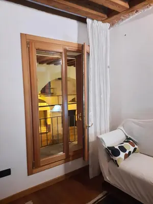 Letto o letti in una camera di Mini Contrà Pescherie