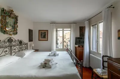 Letto o letti in una camera di Ca' al Giglio - Appartamento Vista Canale