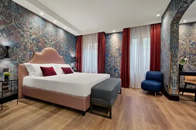Letto o letti in una camera di Hotel American-Dinesen