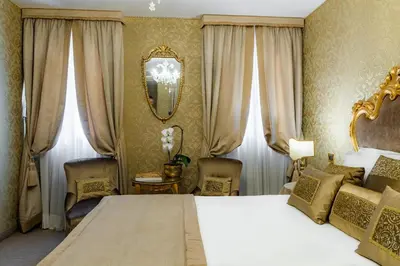 Letto o letti in una camera di Hotel Concordia