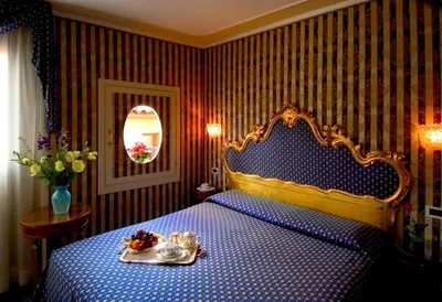 Letto o letti in una camera di Hotel Concordia