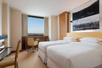 Letto o letti in una camera di Four Points by Sheraton Padova