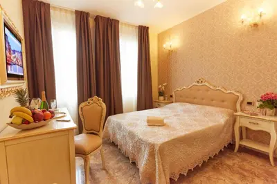 Letto o letti in una camera di New Reiter Hotel