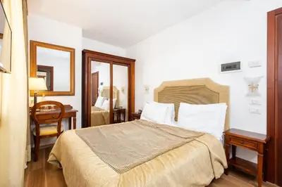 Letto o letti in una camera di Hotel Giardinetto Venezia