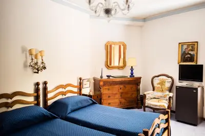 TV o dispositivi per l'intrattenimento presso Residenza d'Epoca Albergo Quattro Fontane