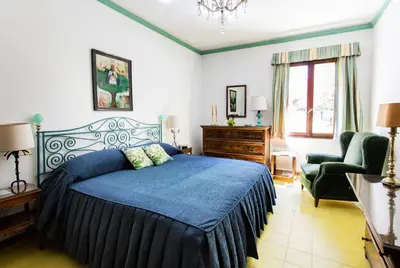 Letto o letti in una camera di Residenza d'Epoca Albergo Quattro Fontane