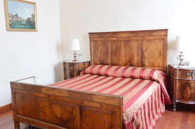 Letto o letti in una camera di Hotel San Zulian