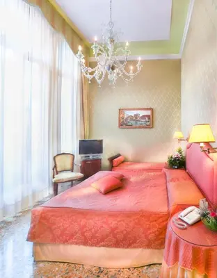 Letto o letti in una camera di Hotel Colombina
