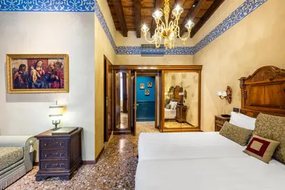 Letto o letti in una camera di Hotel Palazzo Priuli