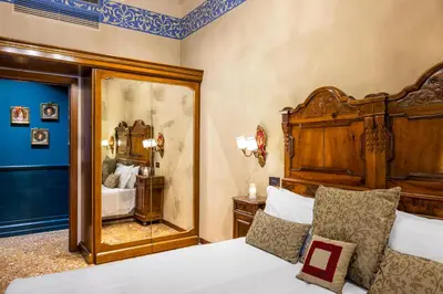 Letto o letti in una camera di Hotel Palazzo Priuli