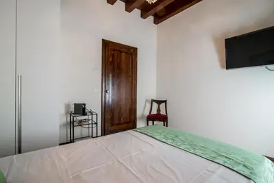 Letto o letti in una camera di Casa Locatelli - Apartment Deluxe & Suite