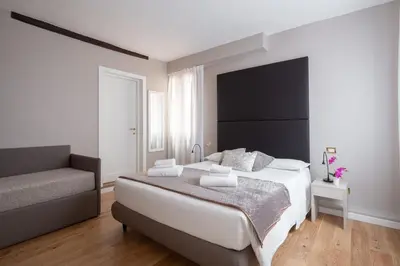 Letto o letti in una camera di Locanda Herion