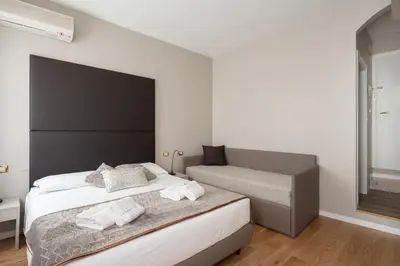 Letto o letti in una camera di Locanda Herion