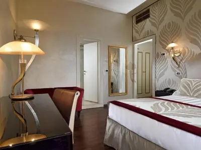 Letto o letti in una camera di Hotel Principe