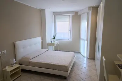 Letto o letti in una camera di Hotel Viña del Mar Pineta