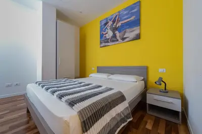 Letto o letti in una camera di Marconi House