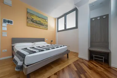 Letto o letti in una camera di Marconi House