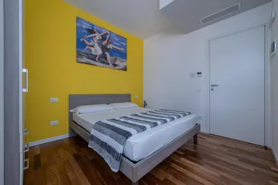 Letto o letti in una camera di Marconi House