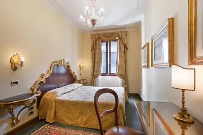 Letto o letti in una camera di Residenza d'Epoca San Cassiano