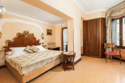 Letto o letti in una camera di Hotel San Moisè