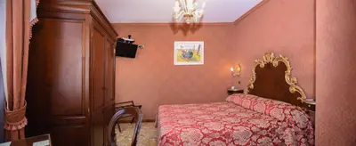 Letto o letti in una camera di Hotel Ateneo