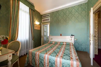 Letto o letti in una camera di Hotel Villa Delle Palme