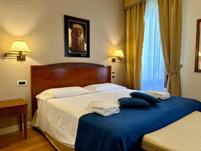 Letto o letti in una camera di Locanda del Ghetto