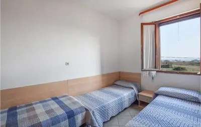 Letto o letti in una camera di Eden 2