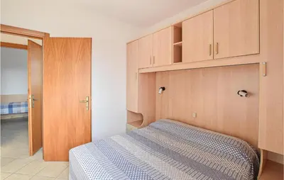 Letto o letti in una camera di Eden 3