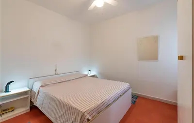 Letto o letti in una camera di Pigne