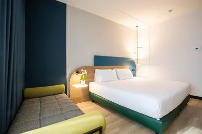 Letto o letti in una camera di Belstay Venezia Mestre