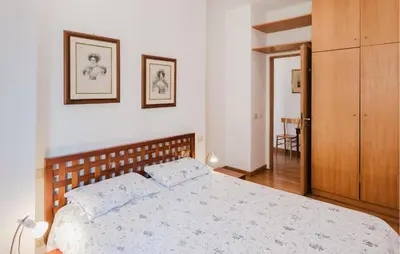 Letto o letti in una camera di Sandalo