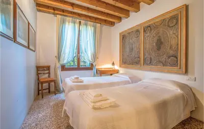 Letto o letti in una camera di Estuario