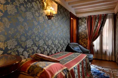 Letto o letti in una camera di Royal San Marco Hotel