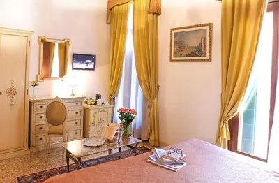 Letto o letti in una camera di Apostoli Palace